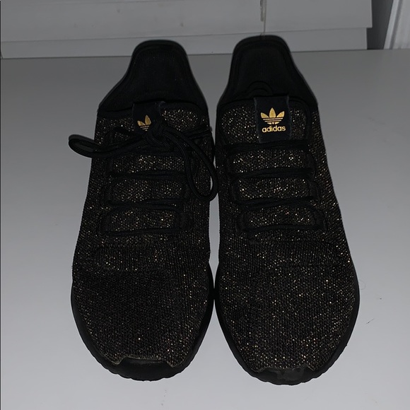black and gold adidas tubular